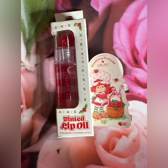 Other - Strawberry Shortcake tinted lip oil with cute strawberry topper